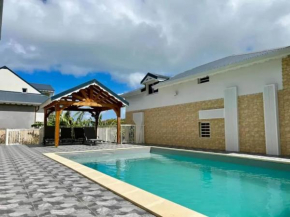 Maison spacieuse à Deshaies avec piscine partagée
